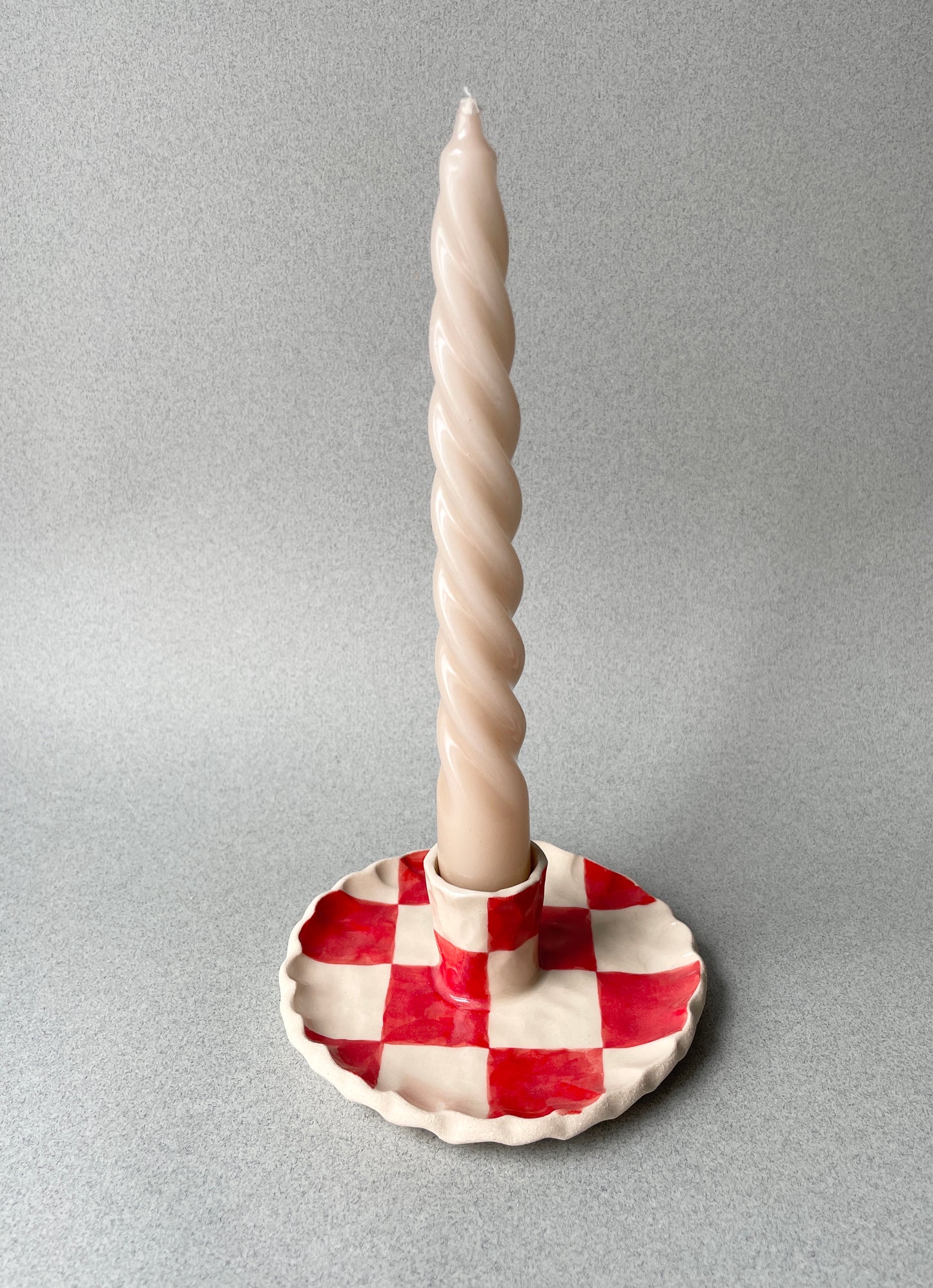 red checkered candle holder
