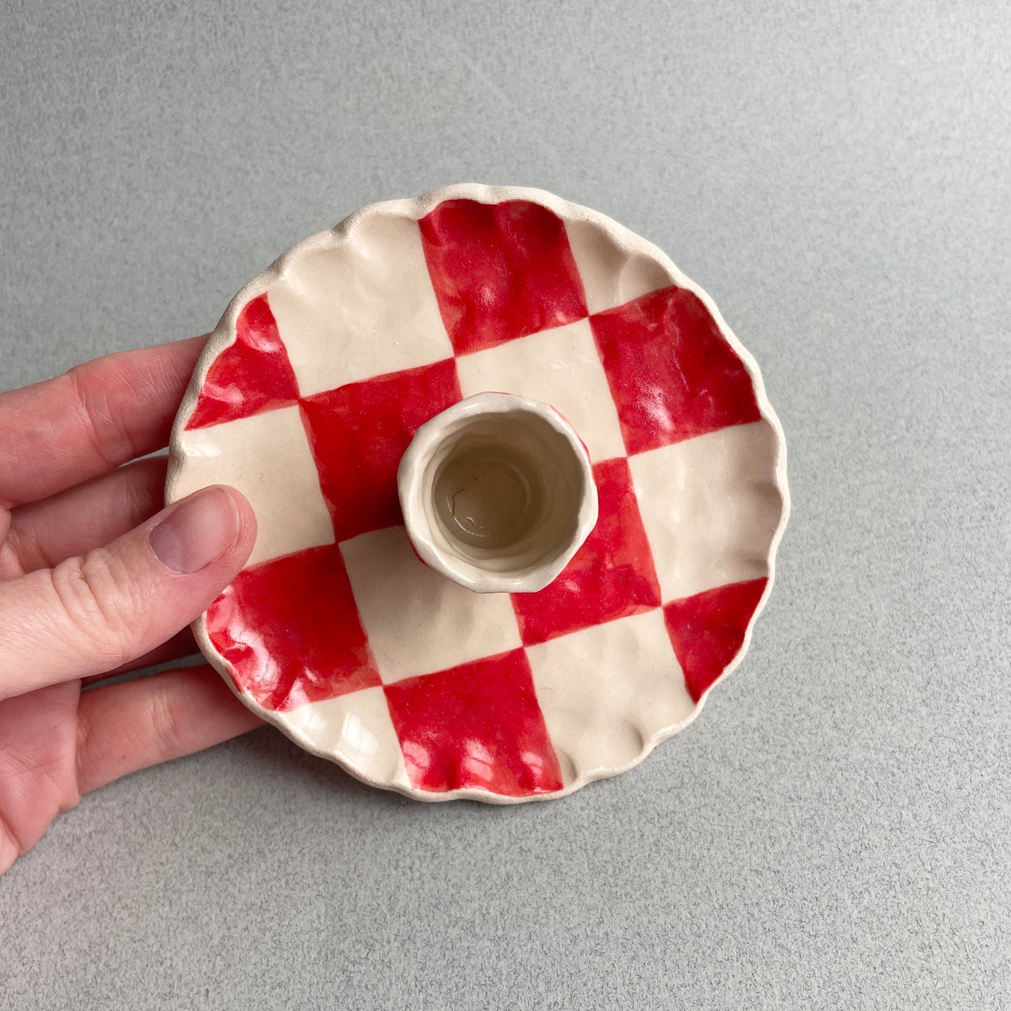 red checkered candle holder