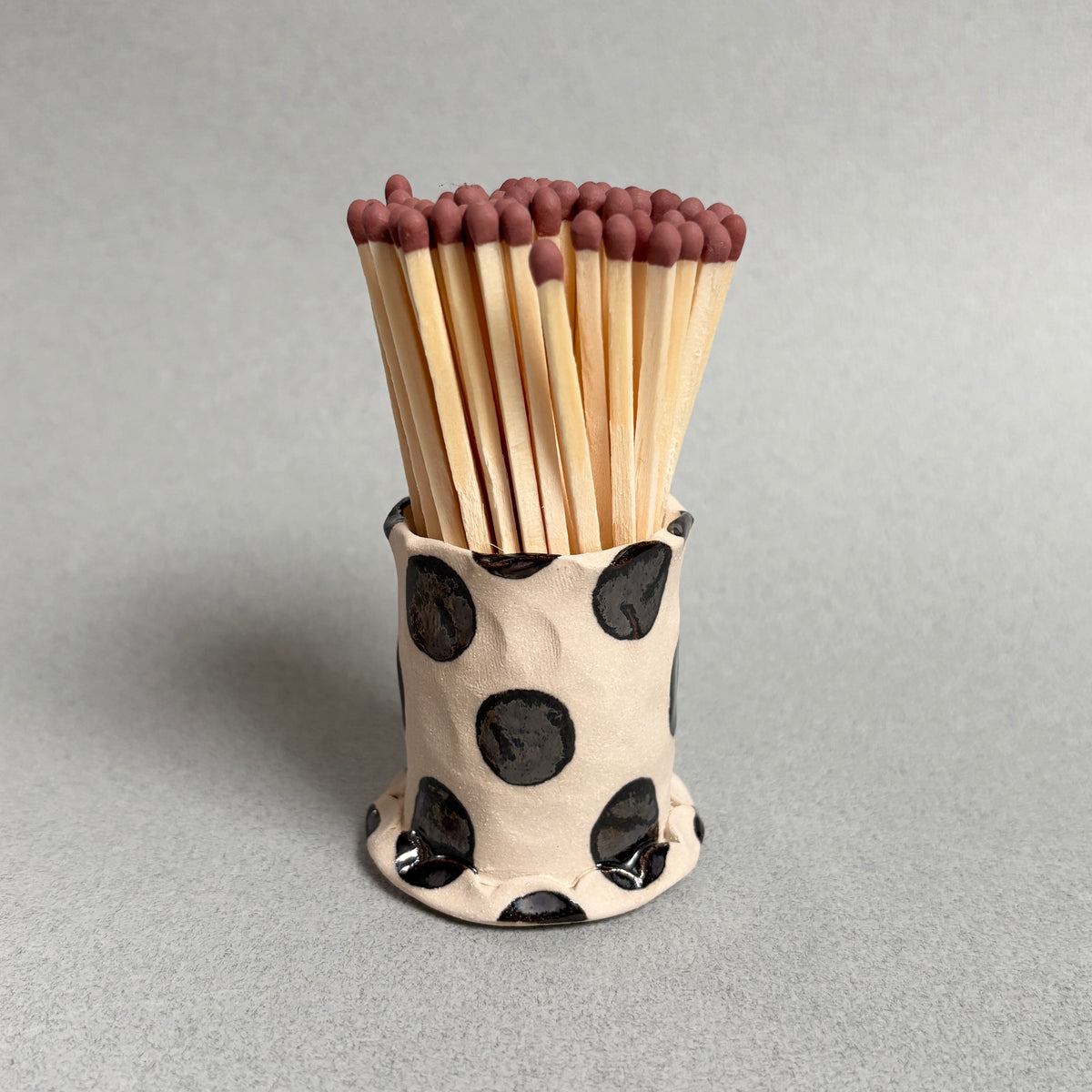silver polka dot match striker