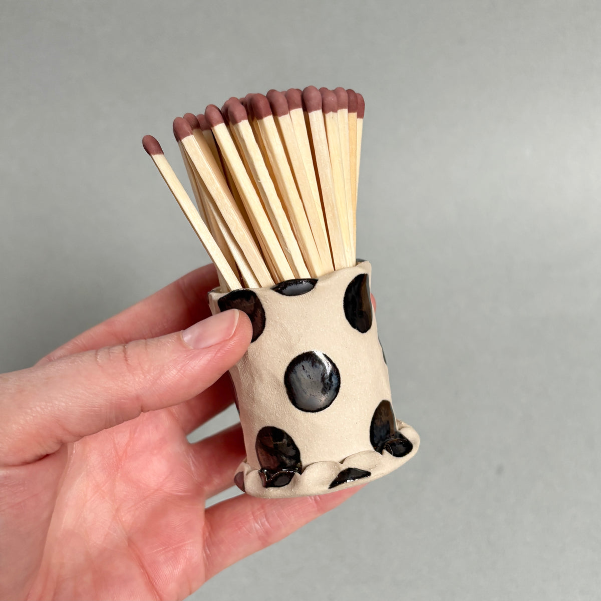 silver polka dot match striker
