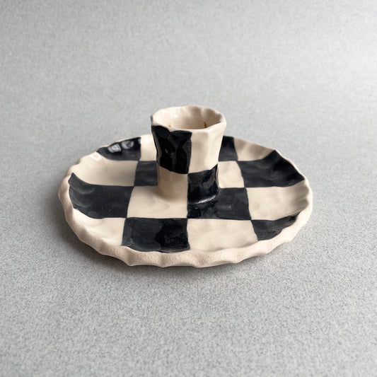 black checkered candle holder